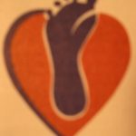 Heart and foot logo